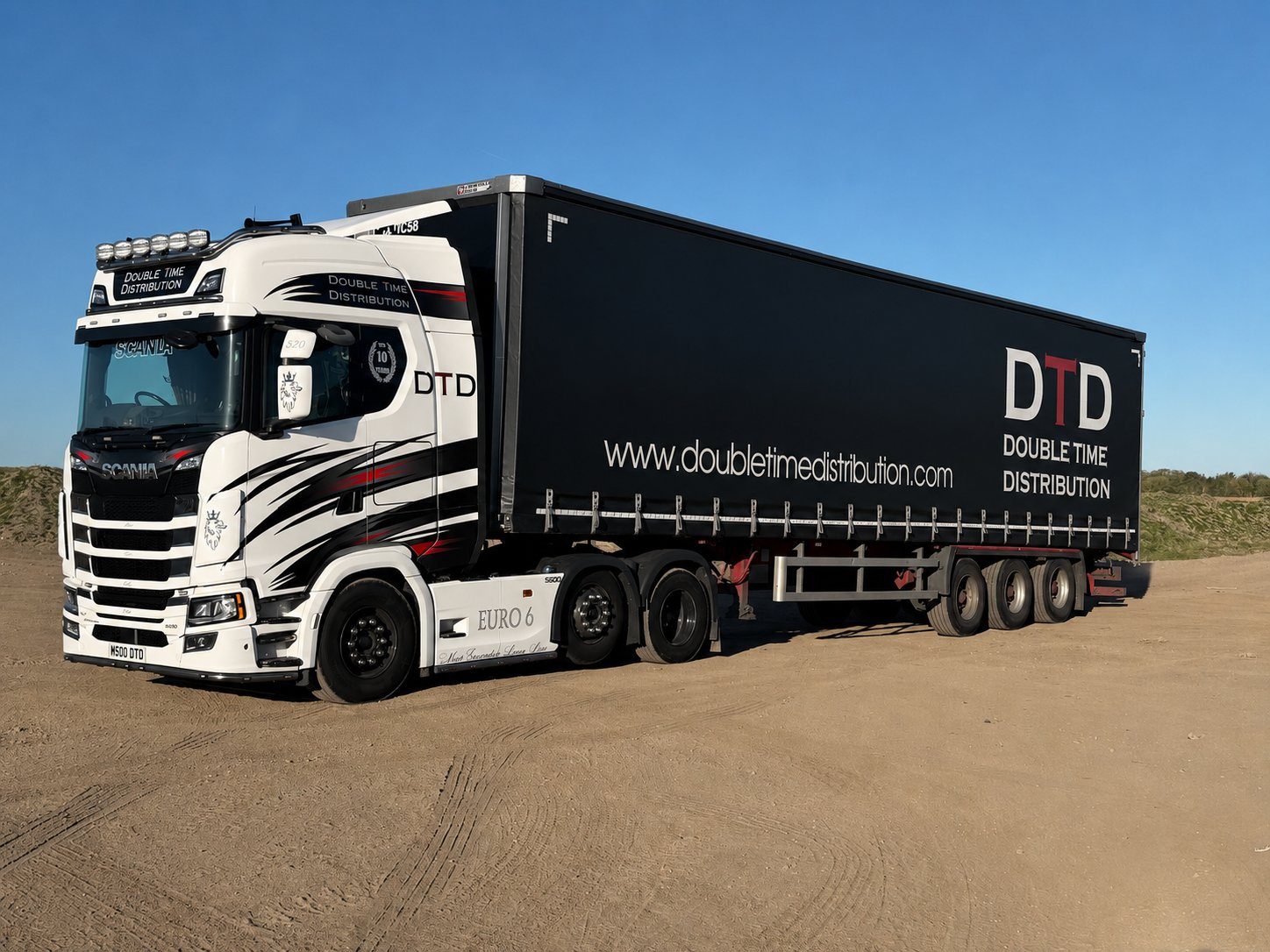 Double Time Distribution curtainsider artic in evening light